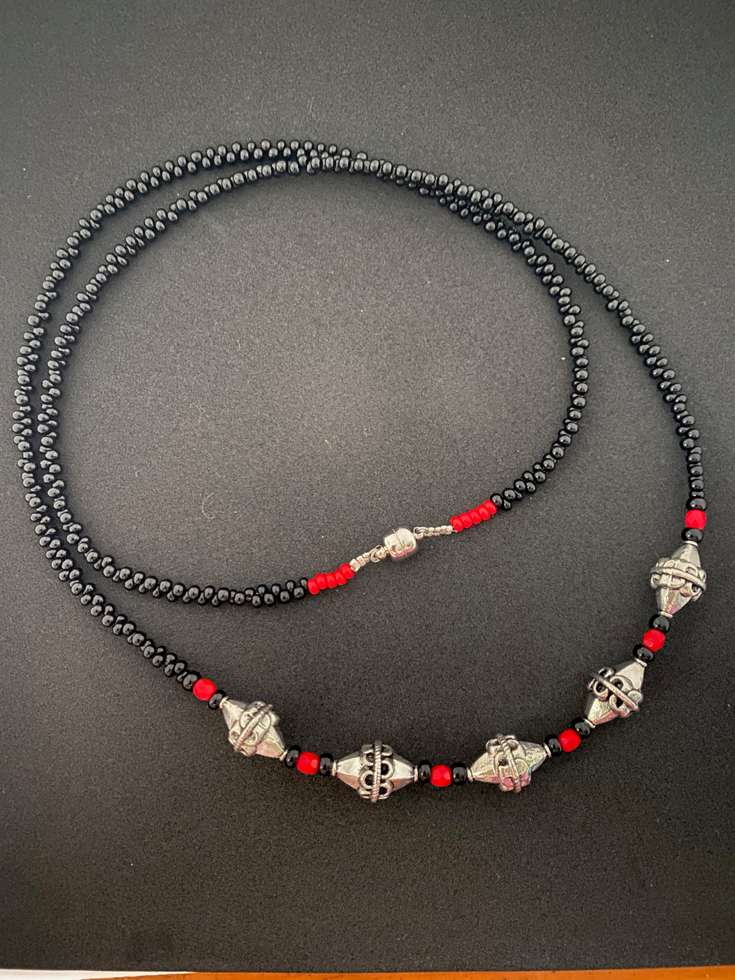 Kṛṣṇaḥ - Black beads with Silver & Red Beads