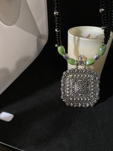 Load image into Gallery viewer, Kṛṣṇaḥ -  Black Beads with Green beads &amp; Pendant
